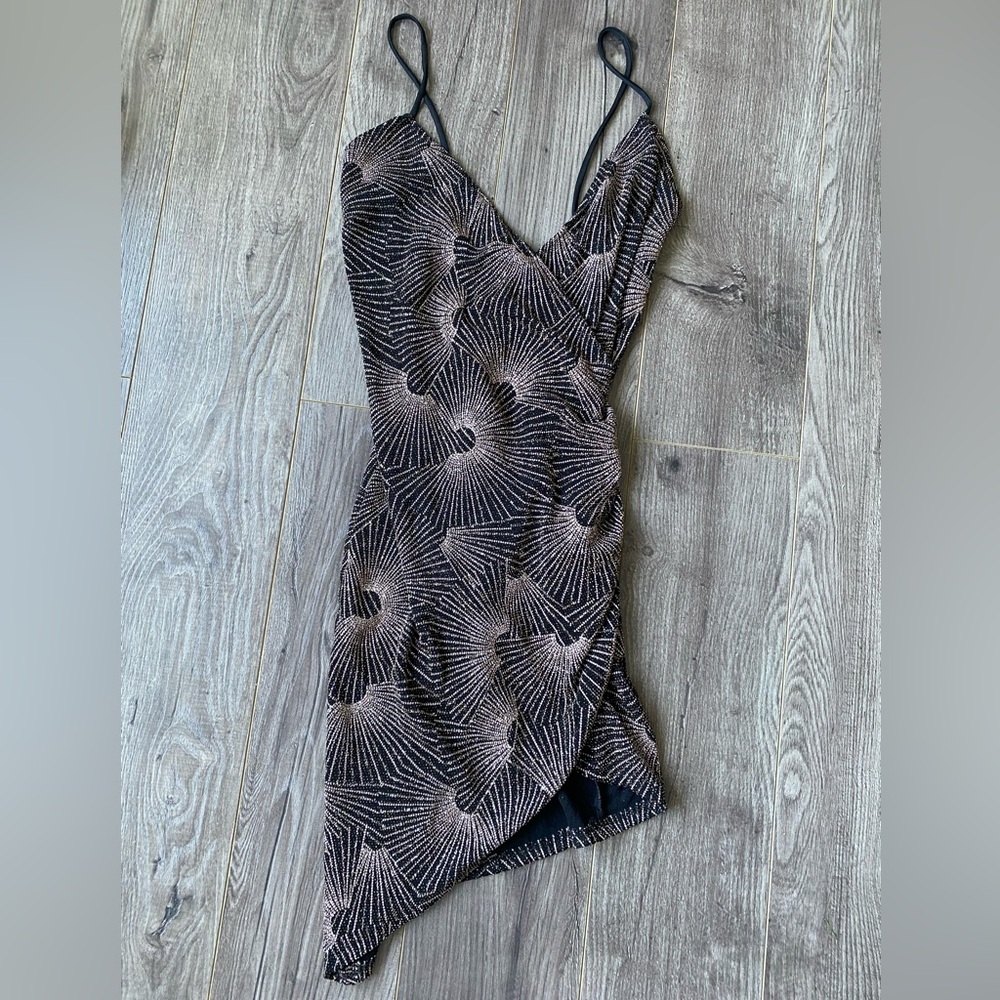 Olive Tree beaded sparkly asymmetrical low cut, low back dress